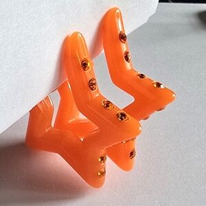 Big star earrings orange rhinestones plastic